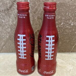 Coca-Cola Collectible Atlanta football cans.
